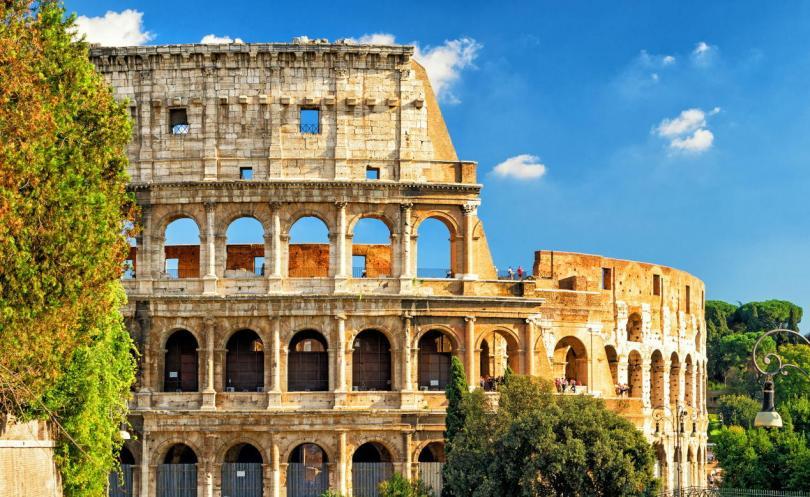 Colosseum (Coliseum) in Rome, Italy. Roman Coliseum is one of the main travel attractions of Rome. Colosseum is the largest amphitheatre ever built. Historical architecture of central Rome.