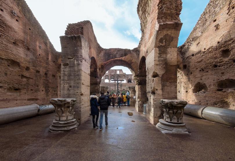 The archeological ruins in historic center of Rome, named Imperial Fora. Here the Colosseum.