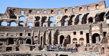 Tourists touring around the Roman Colosseum