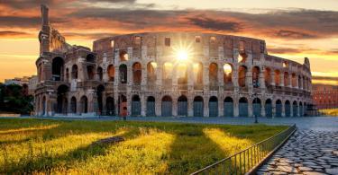 Who is the Colosseum's Architect - Colosseum against colorful sunset in Rome, Italy