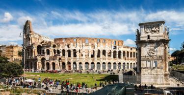 Colosseum of Rome, Italy with Constantine triumphal arch. Panorama Picture