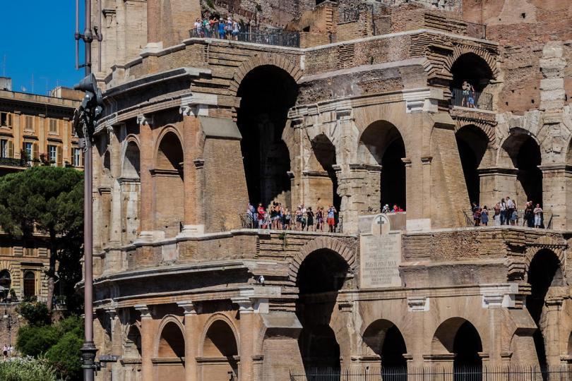 Iconic ancient Colosseum. Colosseum is probably most impressive building of Roman Empire. Originally known as Flavian Amphitheater, it was largest building of the era.