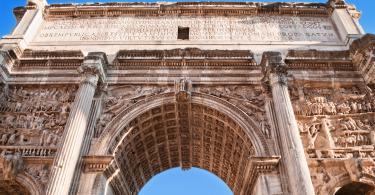 The Arch of Titus at the Forum ruins in Rome, Italy.