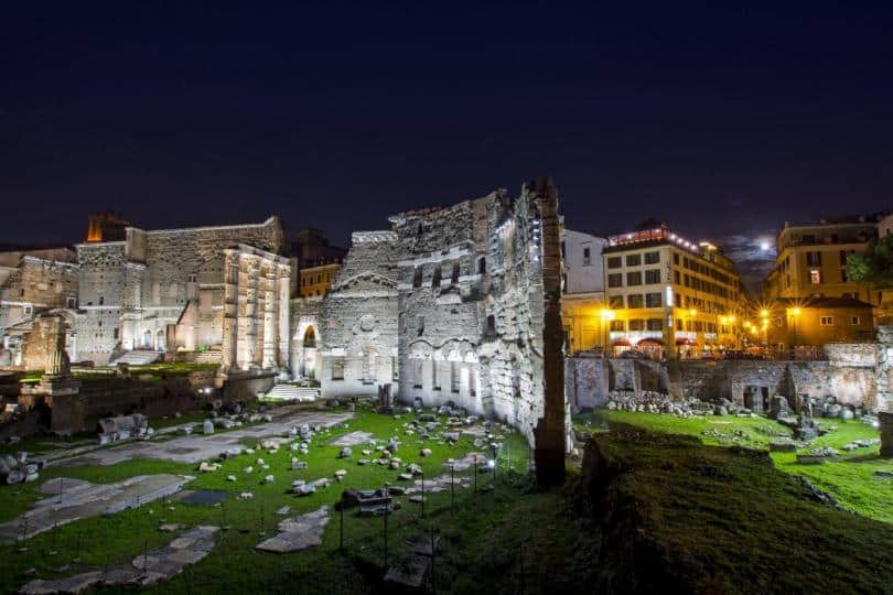 Forum of Augustus and Forum Hotel lit up at night. Beautiful night cityscape suitable for backgrounds.