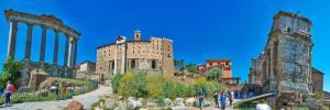 Panoramic view at the Roman Forum with the Temple of Saturn, the Tabularium, the Temple of Vespasian and Titus, and the Arch of Septimius Severus.