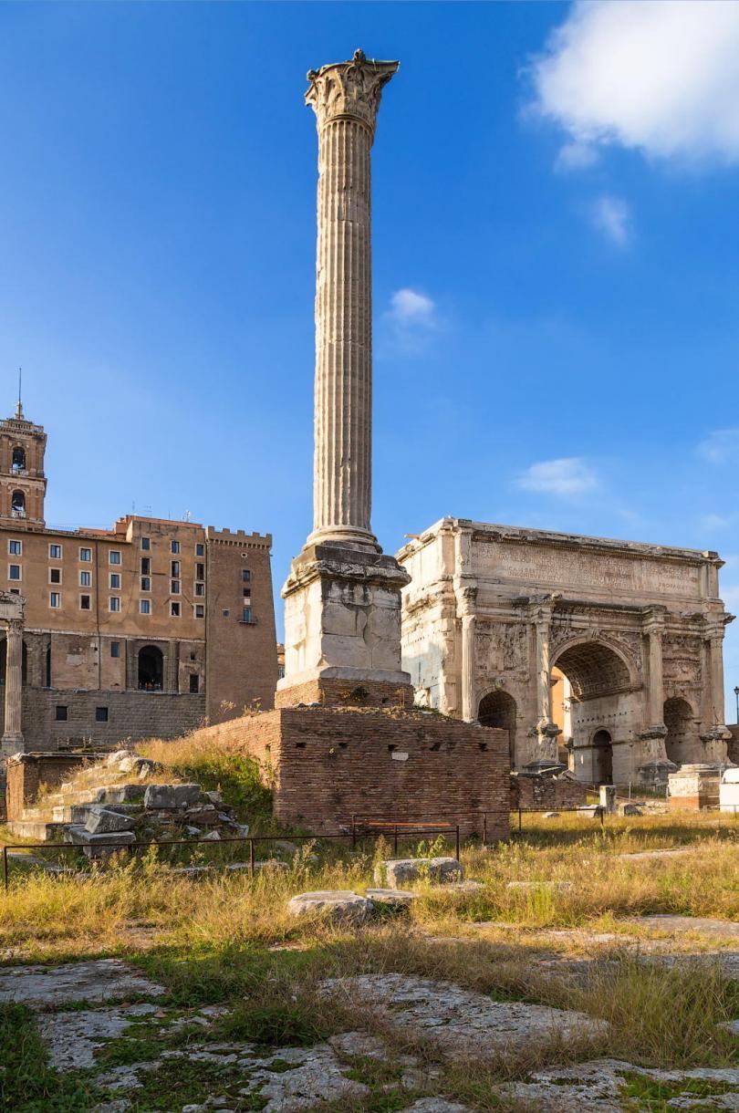 The Roman forum, from left to right the Column of Phocas (608 AD) and the Arch of Septimius Severus (205 AD)
