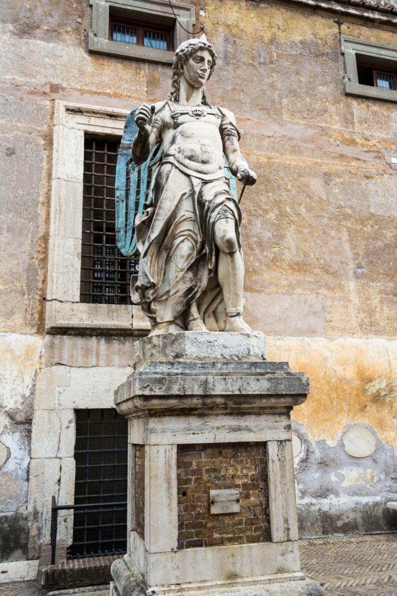 Saint Michael archangel sculpture at the ancient Castel Sant'Angelo. Sculpted by sculptor Raffaello da Montelupo. Rome, Italy.