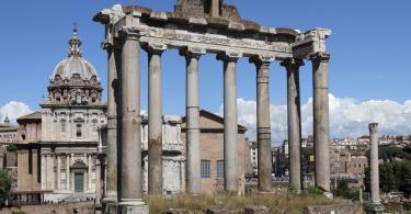 Temple of Saturn in the Roman Forum in the city of Rome, Italy. Gradual collapse over the centuries has left nothing but the front portico standing.