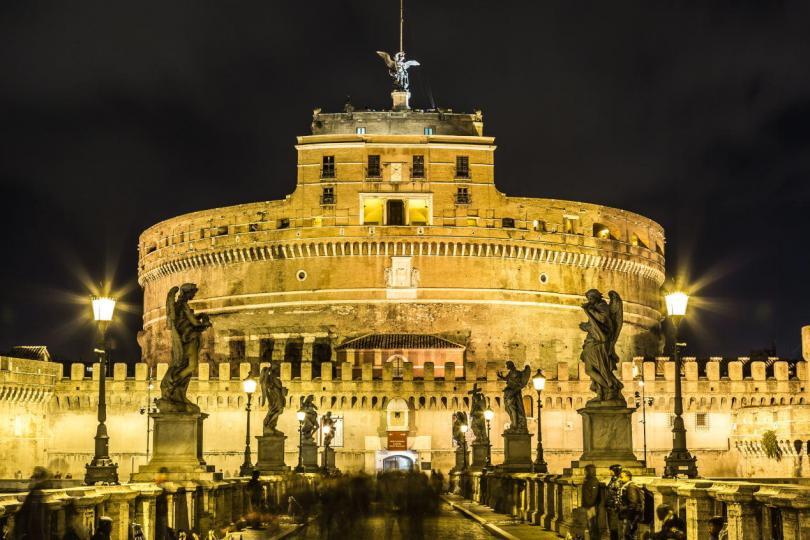 The Mausoleum of Hadrian, usually known as Castel Sant'Angelo and the Sant'Angelo bridge illuminated by night.