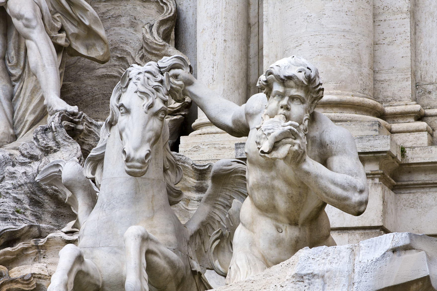 The sculptures of the Ocean and the two tritons, with the winged horses in the central part in Trevi Fountain, Rome, Italy (2)