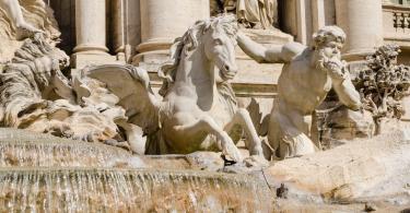 The sculptures of the Ocean and the two tritons, with the winged horses in the central part in Trevi Fountain, Rome, Italy (4)