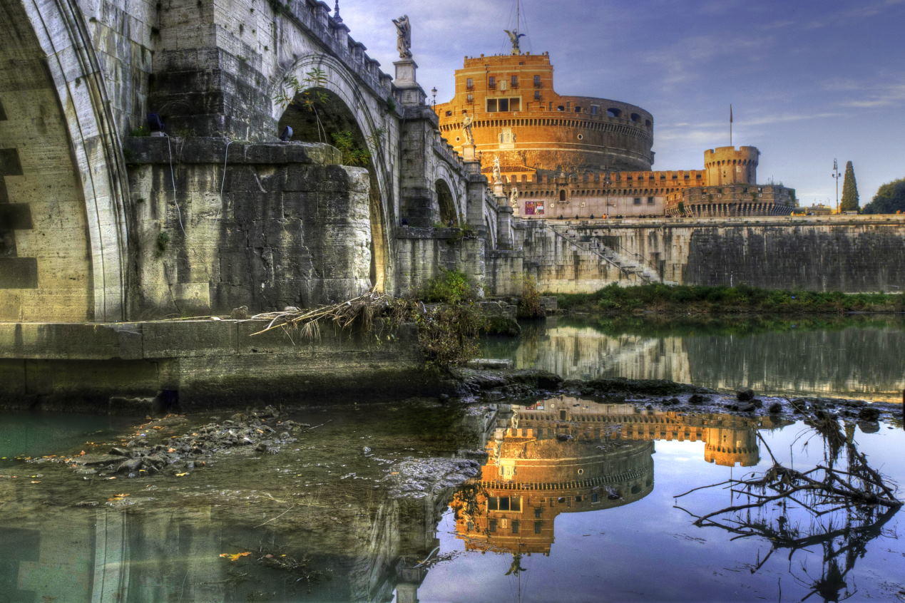 View of Castel Sant'Angelo and of its bridge at sunset, Rome, Italy