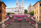 Spanish Steps in the morning with azaleas in Rome, Italy. Rome Spanish Steps (Scalinata della Trinità dei Monti) are a famous landmark and attraction of Rome and Italy.