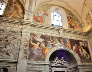 Raphael’s frescoes of the Sibyls - above the arch of the Chigi Chapel, commissioned by Agostino Chigi, the papal banker 