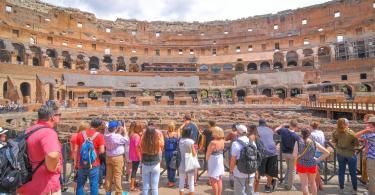 Colosseum Priority Entrance + Arena Floor, Roman Forum and Palatine Hill - Tourists visit the Roman vestiges inside the Colosseum, major touristic attraction in Rome, Italy