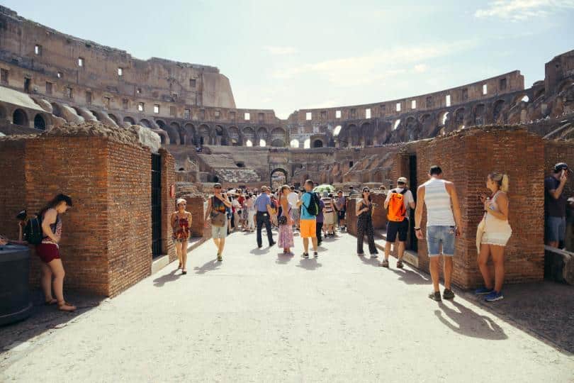 Colosseum and Ancient Rome Walking Tour- Tourist visit the interior of the Colosseum. Colosseum is famous landmark
