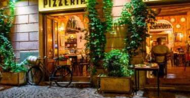 Narrow cobblestone street in Trastevere, Rome